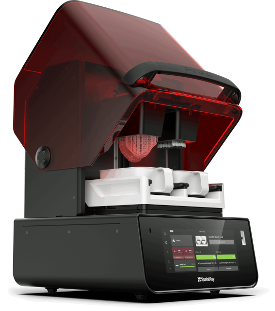 SprintRay Pro 2 dental 3D printer with red cover and touchscreen interface, showcasing advanced technology for same-day crowns and restorations at Renew Family Dentistry.